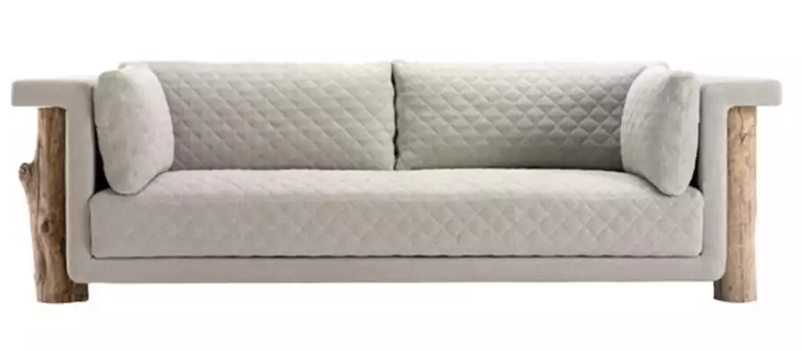 ספה בעיצוב פרנק לברה משולבת עם עצי סחף. 'פנטהאוז רהיטים'.