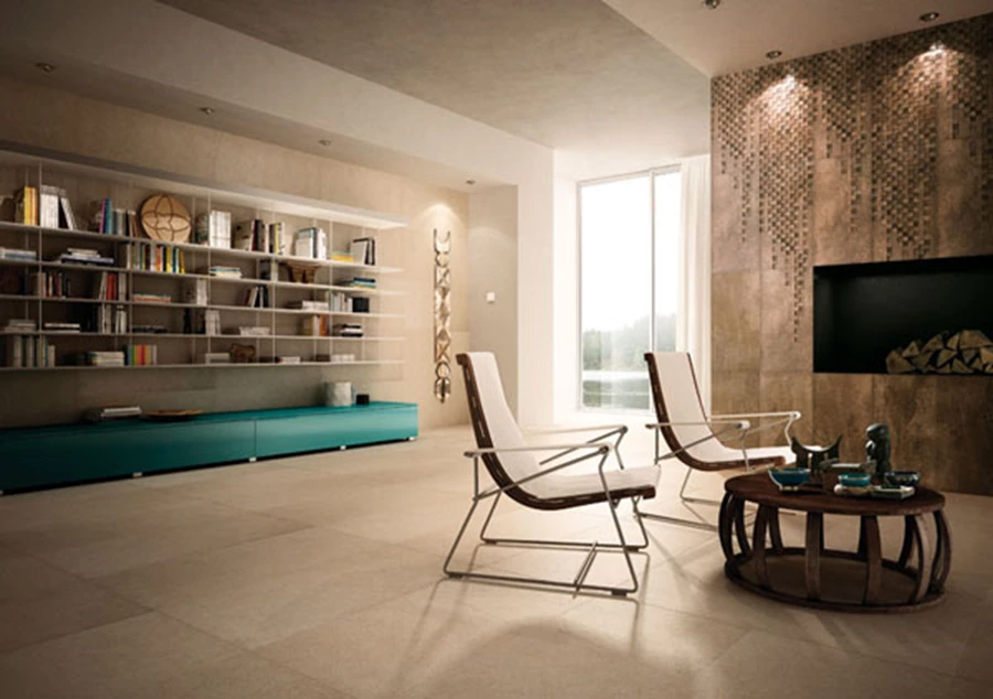 עיצוב חדר המגורים באמצעות שילוב אריחים נדיבי ממדים מדגם 'Lastra', מבית 'Imola'. רשת 'ויה ארקדיה'