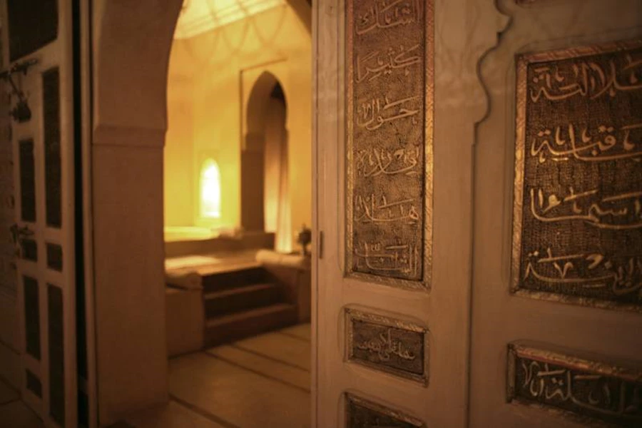 Credit:  Bernd Kolb calligraphers of Morocco, hammered the story in silver on the vast doors